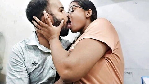 Indian aunty passionately kisses young man in steamy hookup