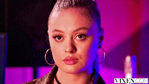 Amber Moore seductive close-up in lingerie, intense gaze for Vixen