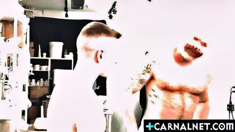 Tattooed muscular hunk bent over kitchen counter as ripped stud fucks his ass doggy style