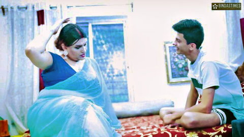 Indian step-mom in blue saree chats intimately with young step-son on bed