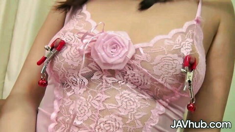 Japanese babe in sheer pink lace lingerie with red nipple clamps on small perky tits