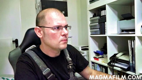 Bald Asian man in office from MagmaFilm's blonde lingerie cumshot video