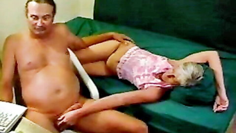 Mature man in sideways sex with blonde mistress, pounding on couch