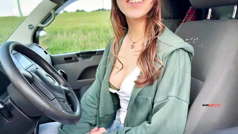 Busty babe smiling with deep cleavage and big tits exposed in car outdoor POV