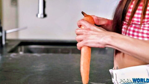 Sexy Asian housewife gripping thick carrot like cock under kitchen faucet