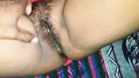 Closeup of hairy South Asian pussy with spread labia and thick black bush