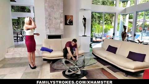 Blonde step-sister in tight red skirt teases kneeling step-brother at home