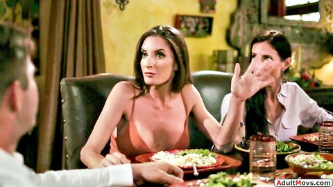 Brunette MILFs in low-cut dresses showing cleavage tease stepson at dinner table
