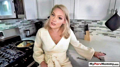 Blonde stepmom Kaleah in white dress teasing in kitchen