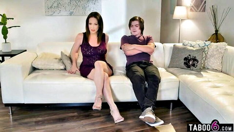 Rayveness as busty MILF stepmom in lacy dress with stepson on couch