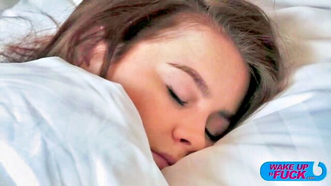 Brunette teen sleeping peacefully under white sheets before wake up fuck