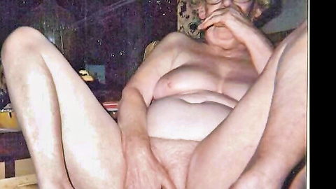 Obese granny with huge hanging belly spreads fat pussy lips naked on couch