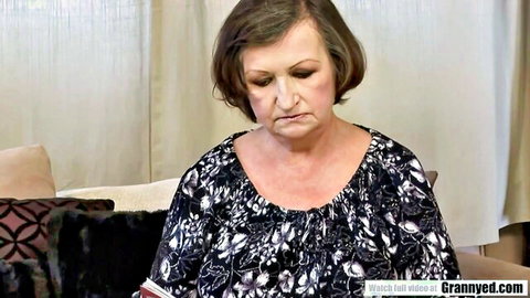 Sexy mature granny in black dress with big ass tease