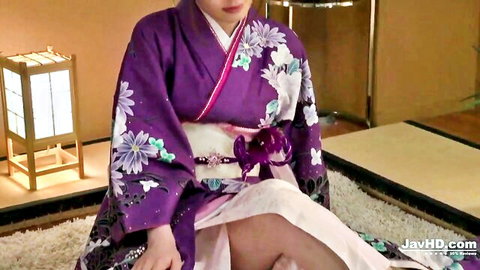 Eri Hosaka in purple kimono, seductive sitting pose teasing thighs