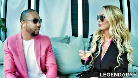 Nikki Benz sips wine with Legendary X in sexy black dress