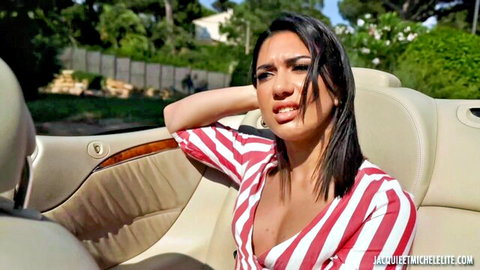 Brunette with cleavage moaning in ecstasy in luxury car seat