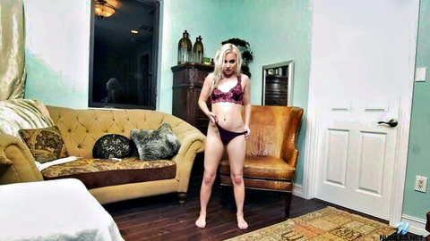 Petite blonde teen babe teasing in pink bra and panties showing small tits and ass in living room