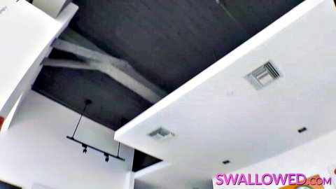 Modern white ceiling with exposed beams and pink Swallowed.com watermark overlay