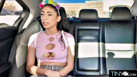 Skinny tanned Latina with small perky tits exposing nipples in car backseat cutout top