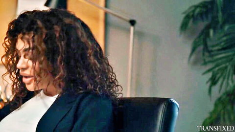 Skye Blue in elegant blazer, curly hair, teasing office vibe