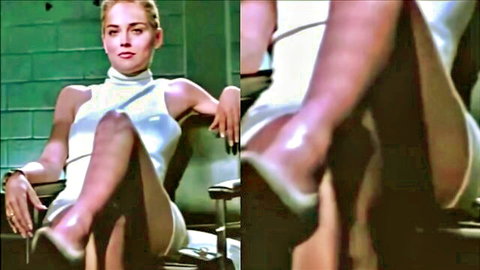 Blonde in tight white dress sits legs crossed then spreads showing pussy cameltoe tease