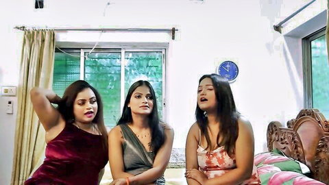 Three naughty Indian women in sexy tops posing playfully together