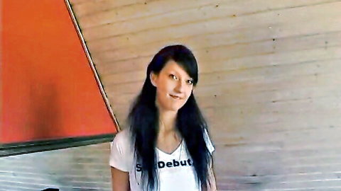 Anika's debut: smiling brunette in white tee, shaved pussy tease