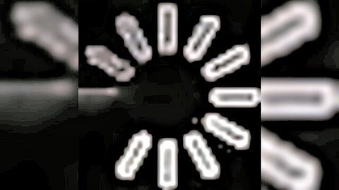 Abstract radial white burst pattern on black background with sharp spikes