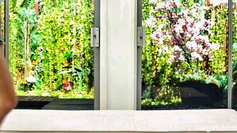 Sofi Adam by window in casting couch tease, garden view