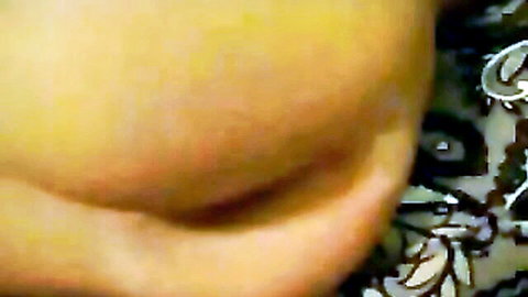 Close-up of plump glossy babe lips parted seductively for blowjob tease
