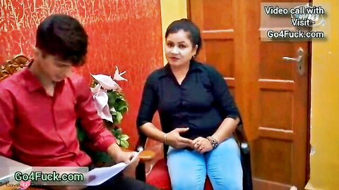 Indian MILF boss with big natural tits interviews young guy in sexy office video call