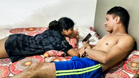 Indian couple cuddling on bed, amateur foreplay tease