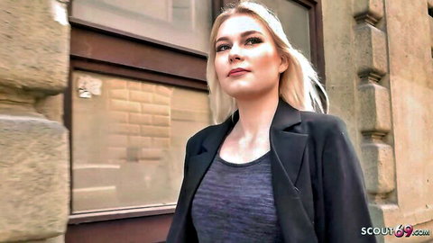 Sexy blonde teen in black blazer smiles seductively on urban street for pickup rough sex