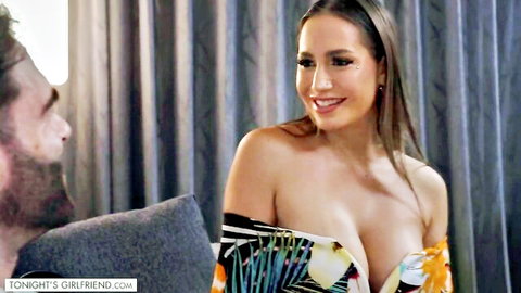 Desiree Dulce in low-cut floral dress, teasing cleavage in intimate girlfriend scene