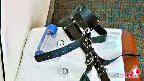 Tobi Nettle and Dolly's BDSM strip-tease with harness and dildo