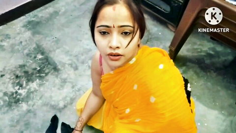 Indian maid in wet yellow saree teasing POV