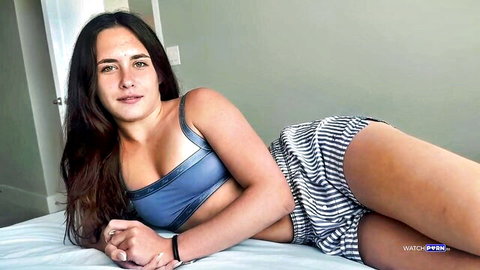 Daisy Phoenix seductive POV pose in blue tank top and shorts