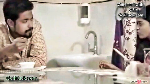 Indian babe in saree sips tea on steamy video call with handsome guy eating in kitchen