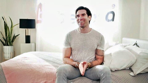 Ken Feels smiling confidently on bed in deepthroat scene with Gizelle Blanco