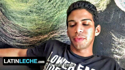 Young Latino guy with sweaty face and glossy cum-glossed lips lying back satisfied after blowjob