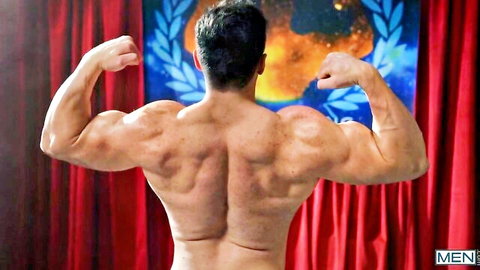 Muscular hunk Clark flexing back view in steamy gay locker room hookup with Malik
