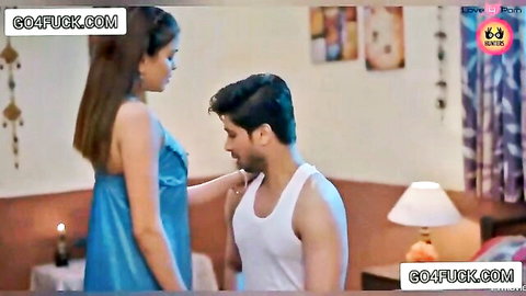 Indian bhabhi in blue nightie seduces kneeling man in teasing encounter