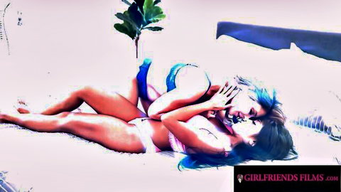 Ember Snow and Krystal Sparks in steamy lesbian scissoring embrace
