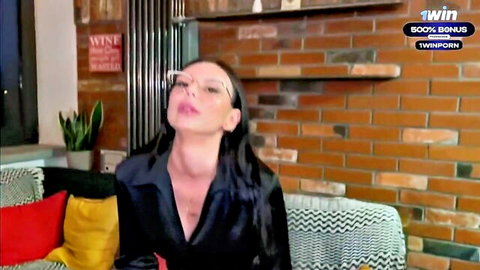 Eva Soda in sexy dark top and glasses, seductive pose for stepmom scene