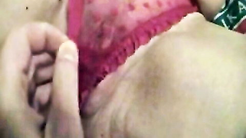 Fingers spreading open tight pink pussy lips revealing wet vagina entrance closeup