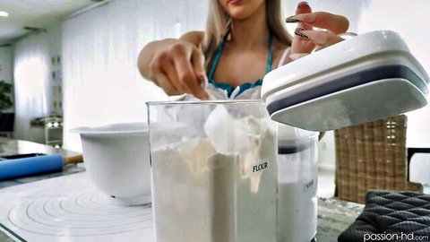 Skylar Vox in sexy blue apron scooping flour playfully, busty blonde babe