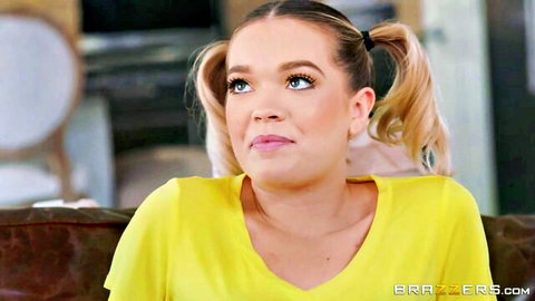Blonde Katie Kush in pigtails and yellow top, teasing stepdad watch scene