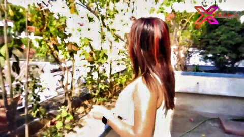 Hot Desi wife Tina in white dress, long red hair, outdoor garden view