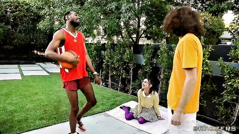 Busty babe in yellow dress with stepbrother, friend, and tall black athlete outdoors