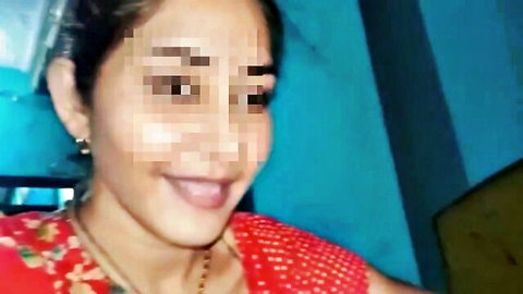Lalita Bhabhi smiling in red saree, steamy Indian sex video thumbnail